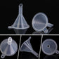 Set of clear plastic mini funnels with short spouts and rim handles