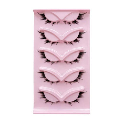 Set of five black fluttery fox-style false eyelashes on a pink display tray