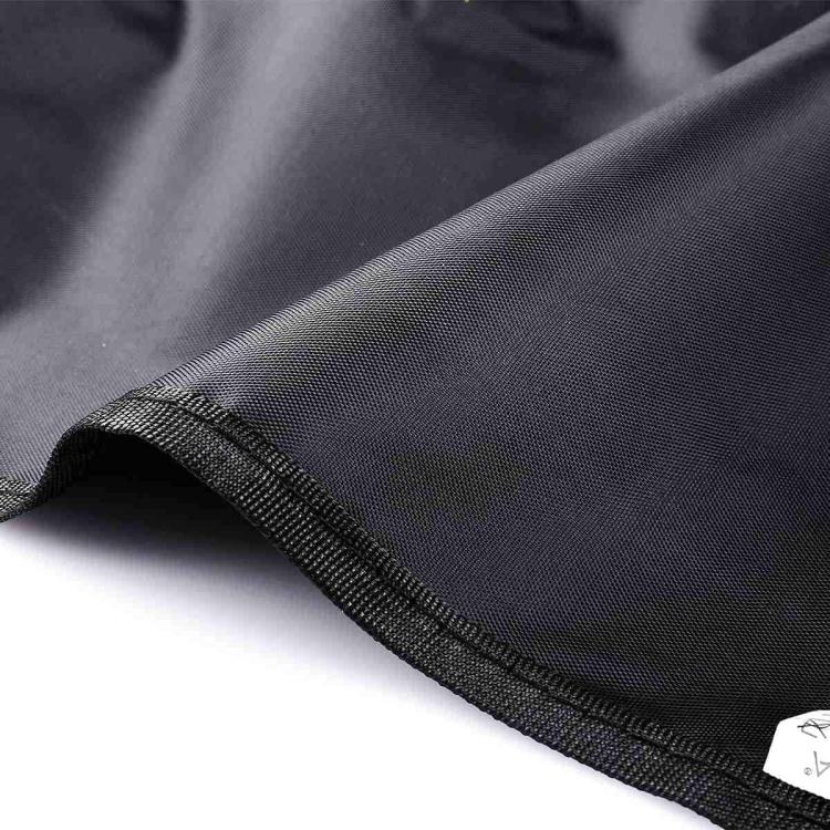 Black BBQ grill cover fabric seam with textured trim detail