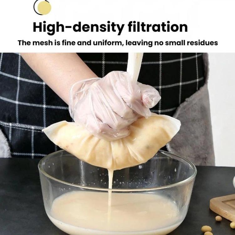 White filter bag strained liquid with gloved hands over a glass bowl.