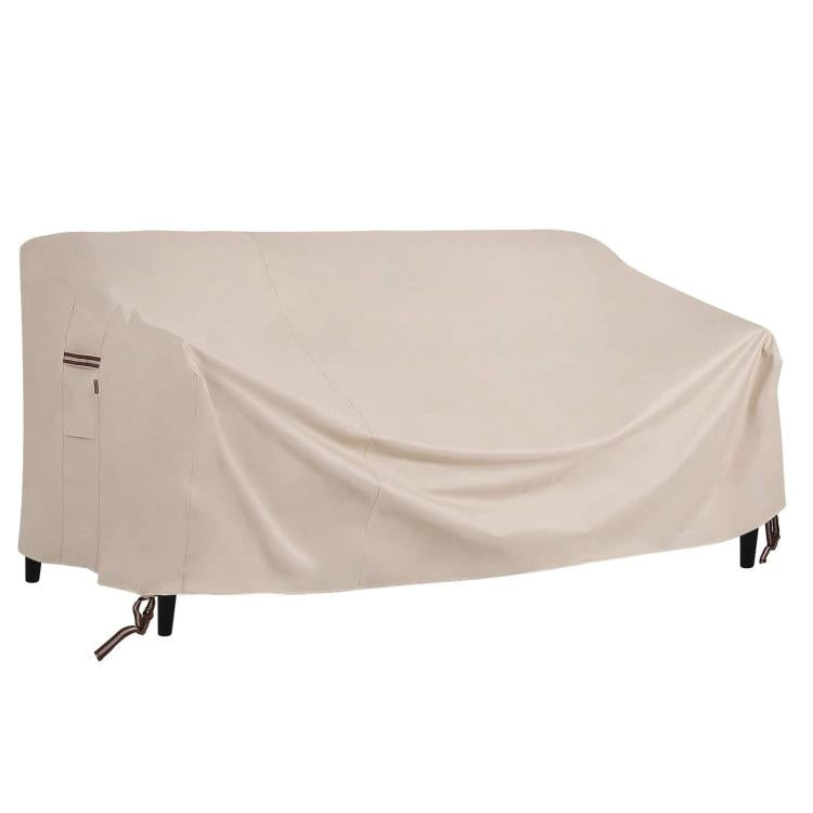 Beige outdoor sofa cover for patio couch, fitted shape with tie-down straps