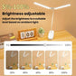 Dual-head LED reading lamp with brightness adjustment slider and white tabletop base.