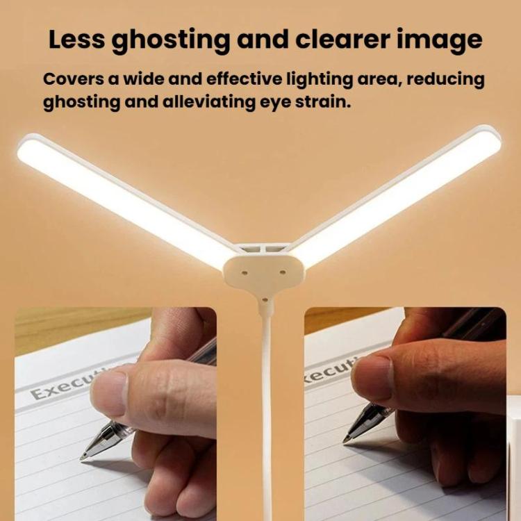 Dual-head LED clip-on lamp with hands inserting the white clip into place.