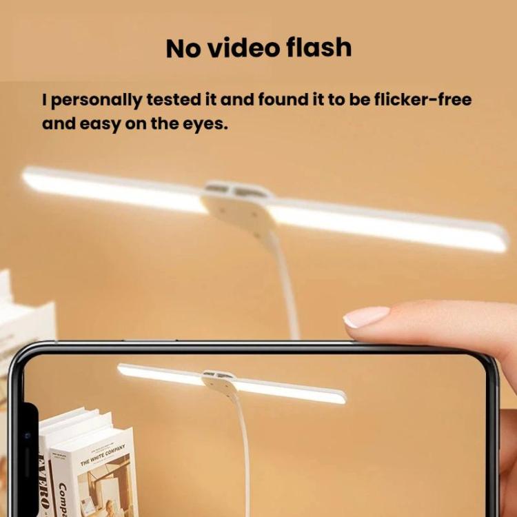 Dual-head LED clip-on lamp, white, with long light bars for desk reading.