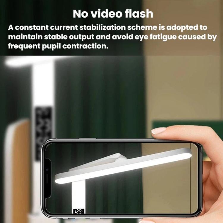 White portable LED desk lamp with bright light bar, shown with smartphone
