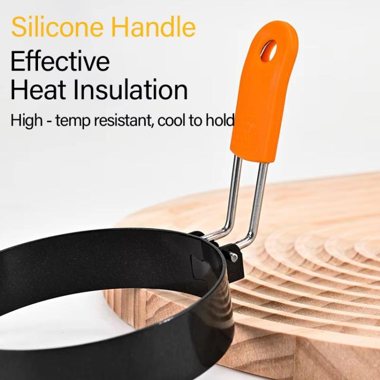 Black egg mold with orange silicone heat-insulated handle and curved metal support