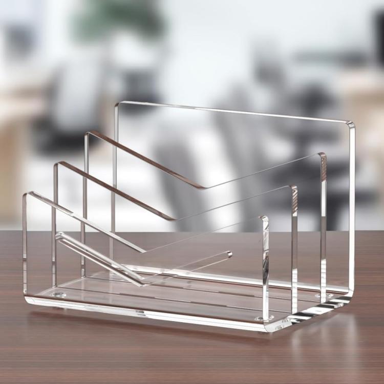Clear acrylic 3-layer letter organizer with multiple angled compartments on tabletop