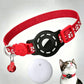 Cat tracker collar with red reflective paw pattern strap and white tracker puck