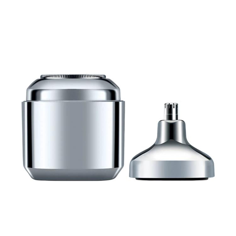Mini electric shaver with silver body and separate nose trimmer attachment