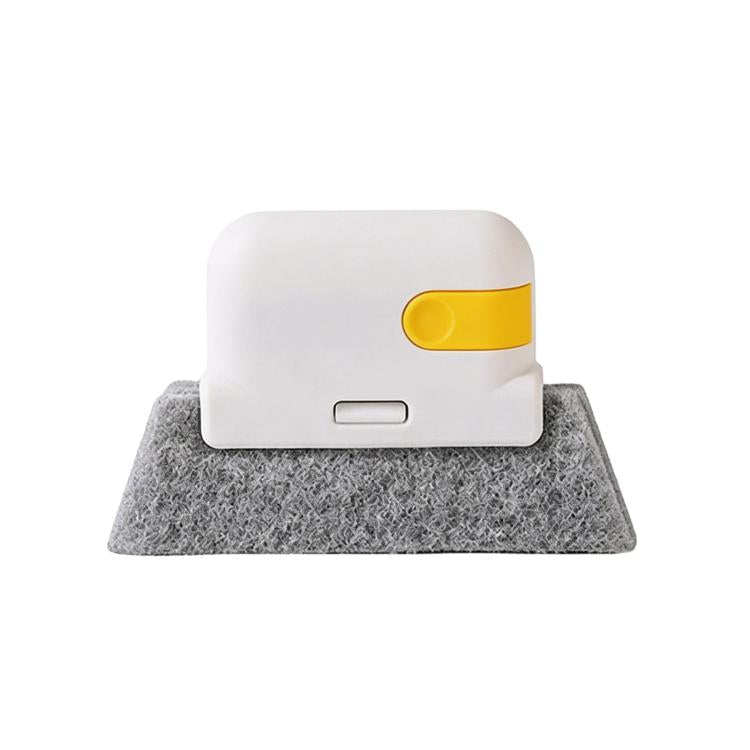 White and yellow hand brush with gray scrub pad for sliding door track cleaning