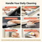 Cleaning brush for kitchen and bathroom surfaces with gray pad and white handle