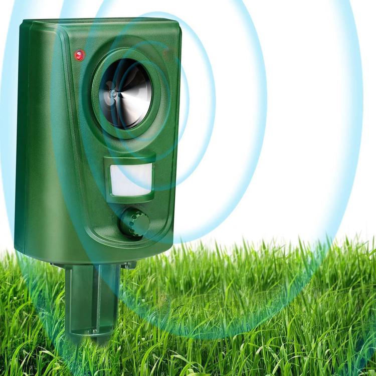 Green square outdoor animal repeller with circular sensor lens and stakes