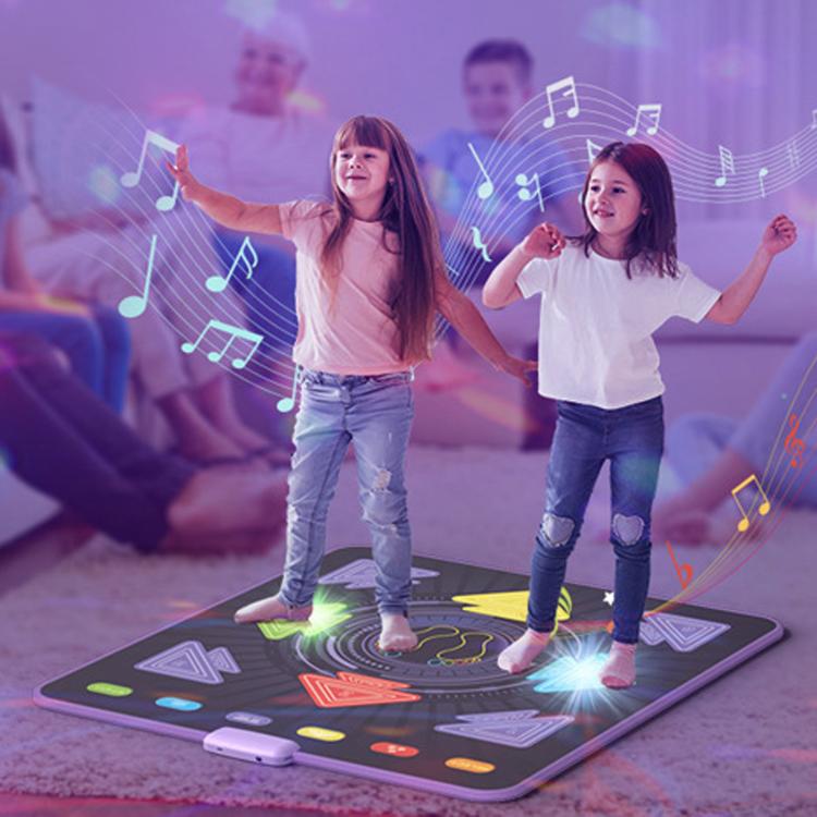 Kids light-up dance mat with glowing arrow tiles and center footpad, wireless music host