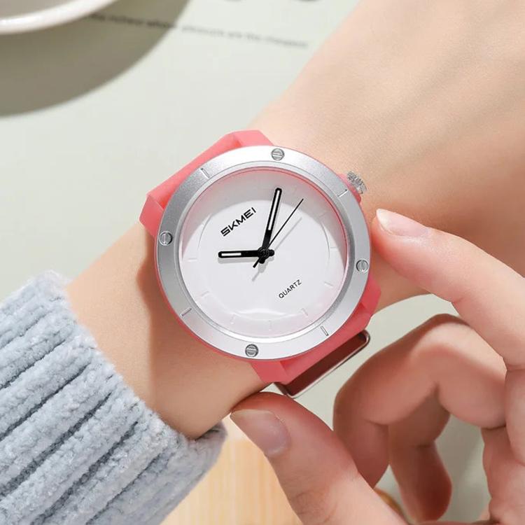 SKMEI unisex watch with silver bezel, white dial, and red silicone strap