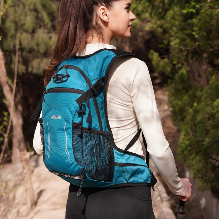 Waterproof cycling backpack in blue with side mesh pocket and adjustable shoulder straps