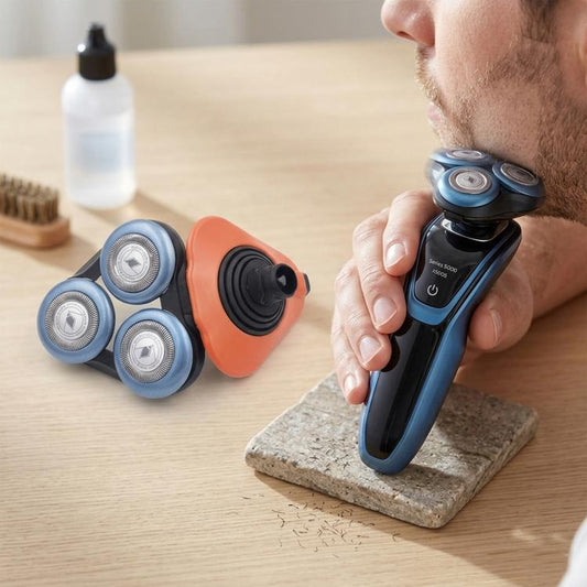 Orange and blue shaver head blades with three circular foil cutters