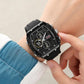 Black digital sports watch with dual displays and rugged bezel on wrist