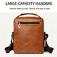Tan leather-look large crossbody bag with top handle, front pocket, and zipper.