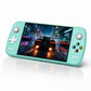 Mint green handheld gaming console with 7-inch screen and dual thumbsticks