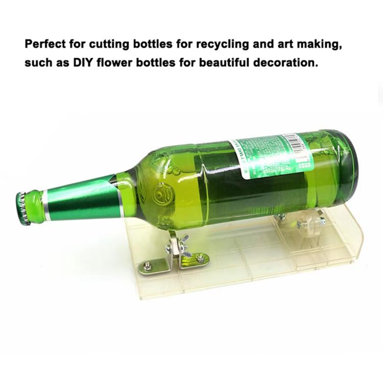Glass bottle cutter tool with clear base holding a green wine bottle