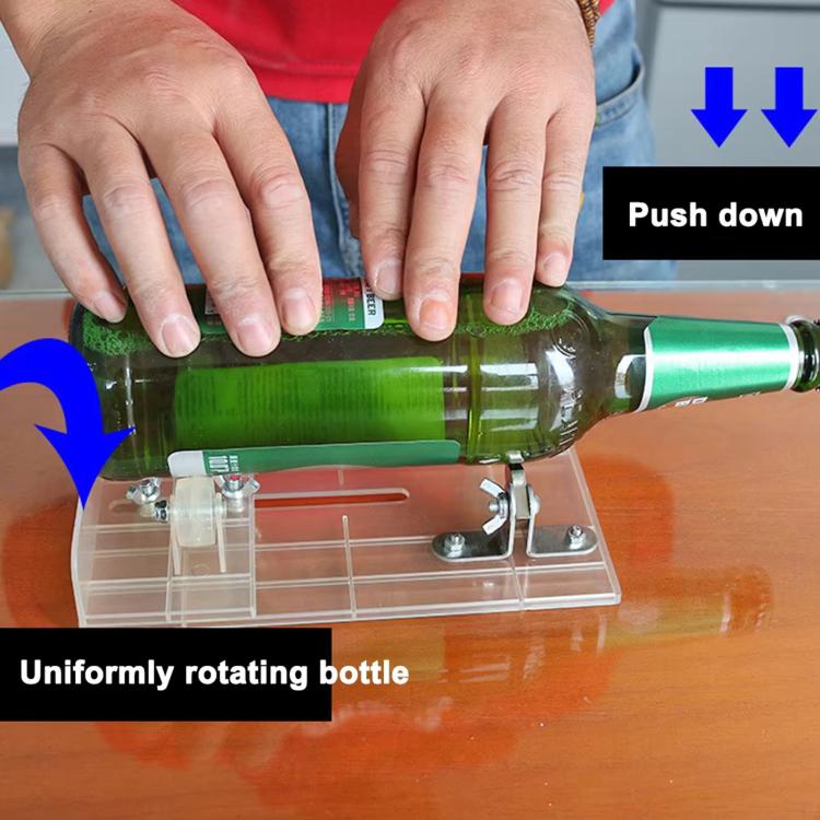 Glass bottle cutter tool with clear base, rotating bottle support, and metal cutting arm