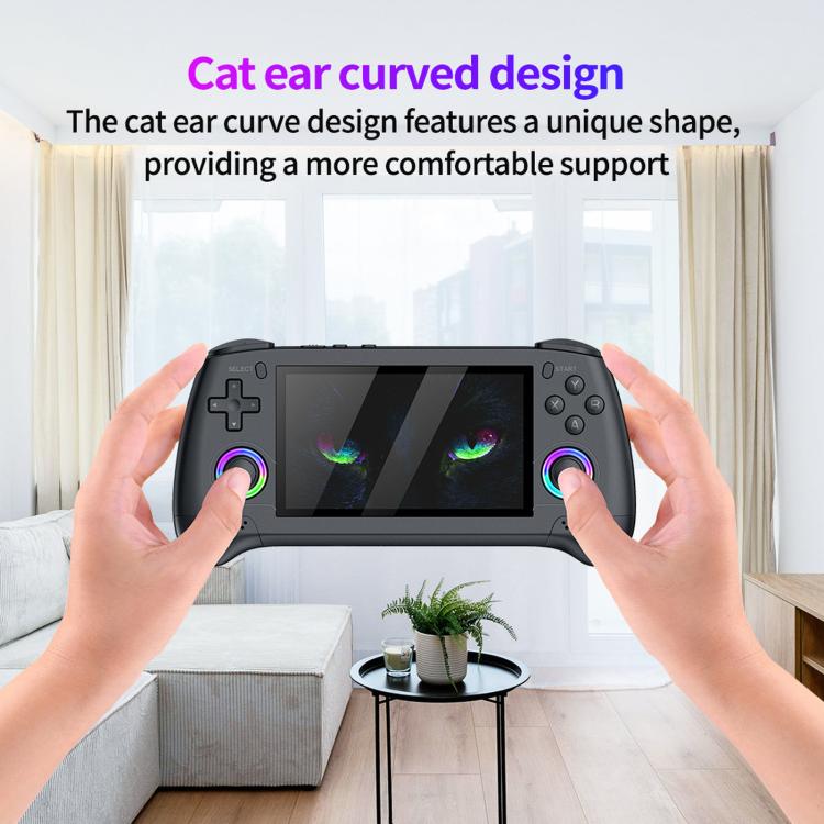 Handheld retro game console held in hands with cat-ear curved top design