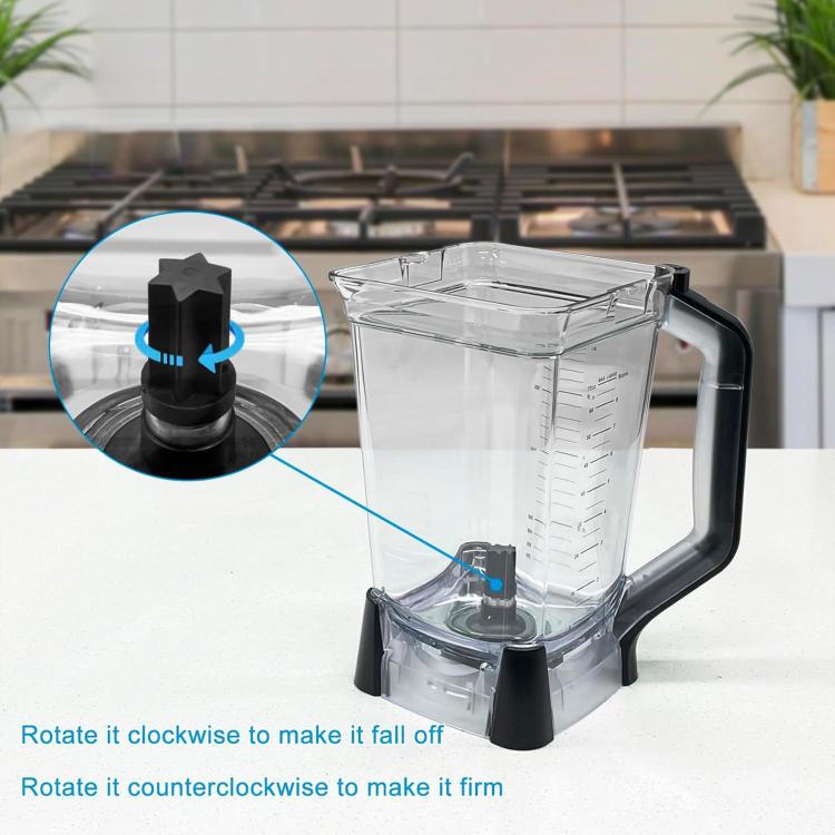 Blender base with black blade driver clutch and metal drive pin stud, close-up