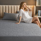 Waterproof fitted baby sheet with quilted geometric pattern, dark gray