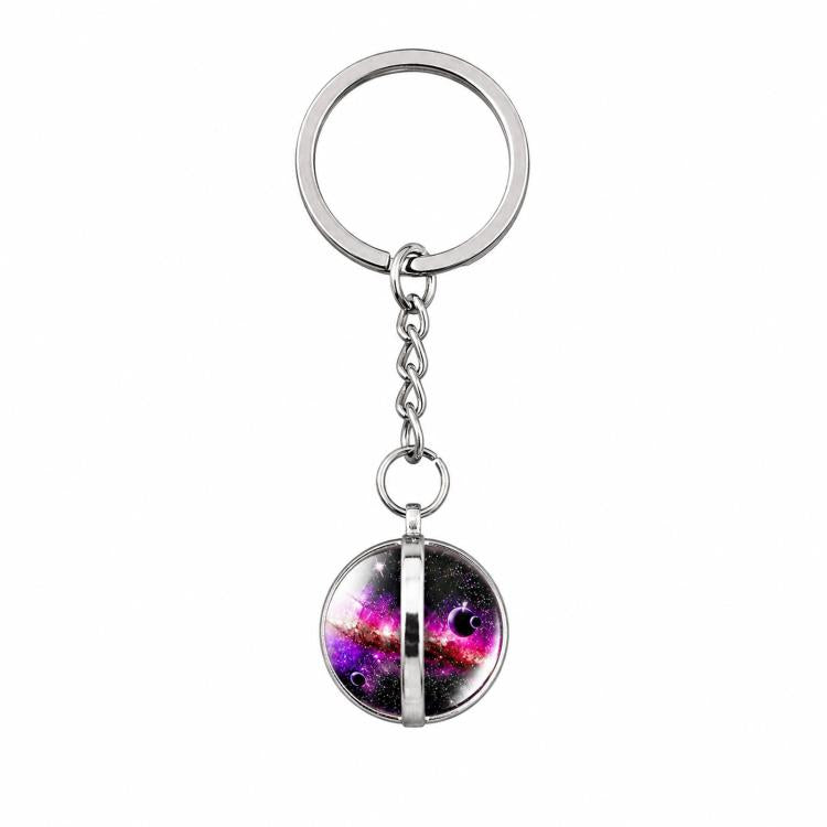 Galaxy crystal ball keychain with silver keyring and dangling chain loop.