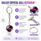 Galaxy crystal ball keychain with silver keyring and chain, purple starry globe.