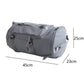Gray duffel travel bag with front zipper pocket, top flap, and shoulder carry handles