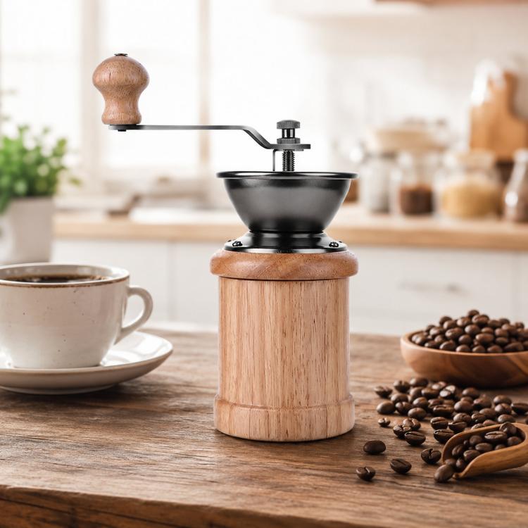 Light wood hand grinder with crank handle, black coffee hopper, and metal adjustment parts