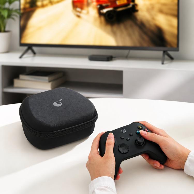 Hard-shell controller case placed on a table with a controller being inserted