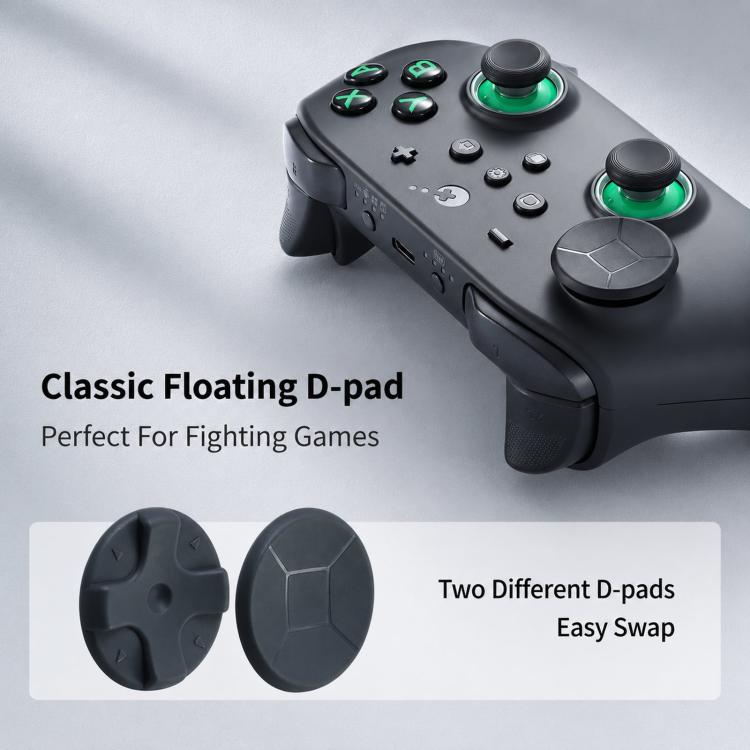 Wireless game controller, dark finish with green analog caps and floating D-pad