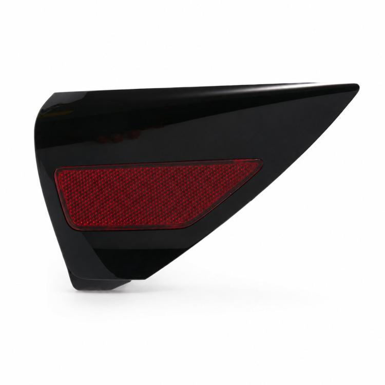 Right-side black taillight trim panel with red rectangular reflector.