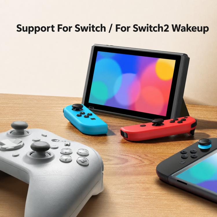 Nintendo Switch handheld with blue and red Joy-Cons on a wooden table.