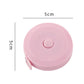 Pink mini retractable tape measure case with 5 cm width, single-button top