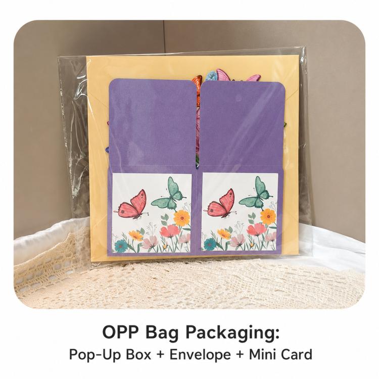 Packaged 3D pop-up butterfly greeting card in clear sleeve with purple insert and box