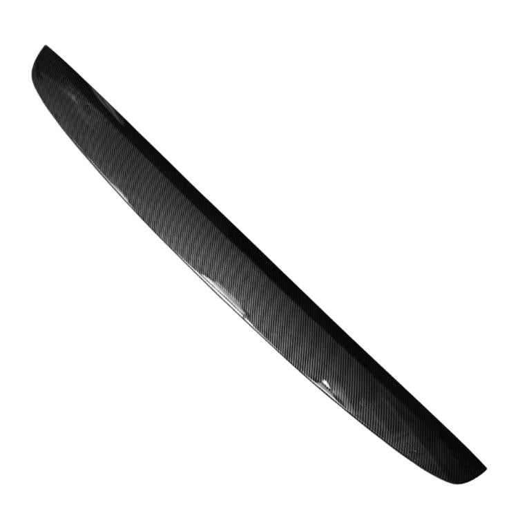 Carbon-fiber styled dashboard trim strip with dark glossy finish, long curved piece
