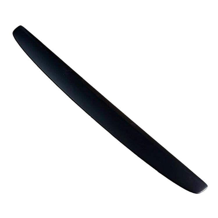 Glossy black carbon-fiber styled dashboard trim strip, long slim curved piece