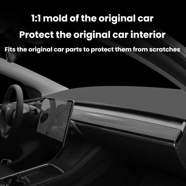 Matte dashboard trim strip installed along the center area in a car interior