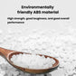 ABS plastic material pellets shown in a wooden spoon