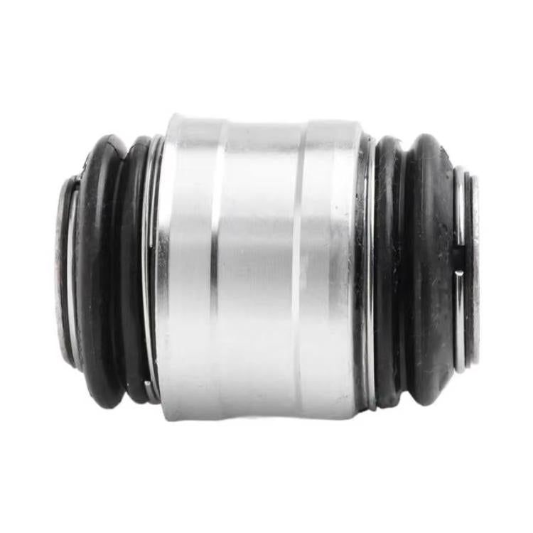 Rear steering knuckle bushing, side view, silver metal sleeve with black rubber edges