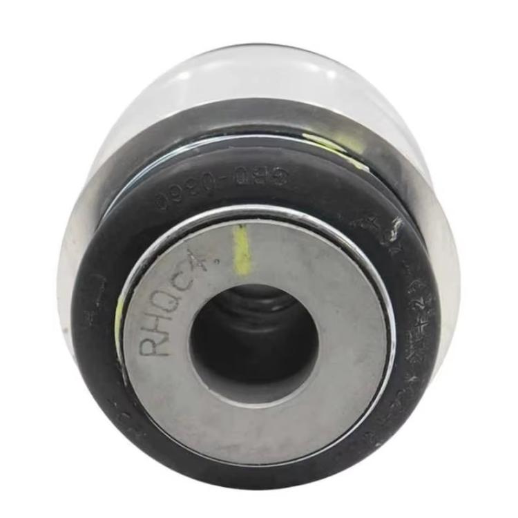 Rear steering knuckle bushing face view with center hole and black outer rubber