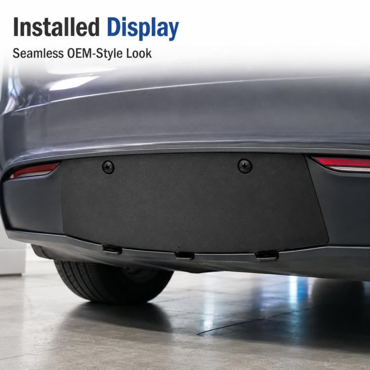 Installed black rear bumper lower guard cover on a Tesla Model 3 rear bumper area