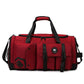 Wine red gym travel bag with black straps, front flap pocket, and logo patch.