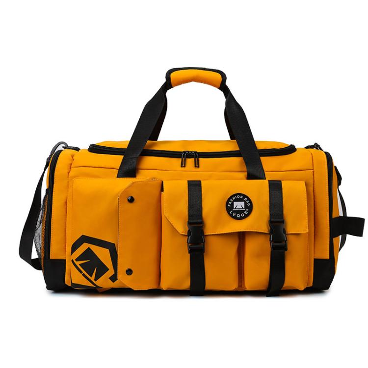 Yellow gym travel bag with black straps, front flap pocket, and logo patch.