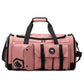 Pink gym travel bag with black straps, front flap pocket, and logo patch.