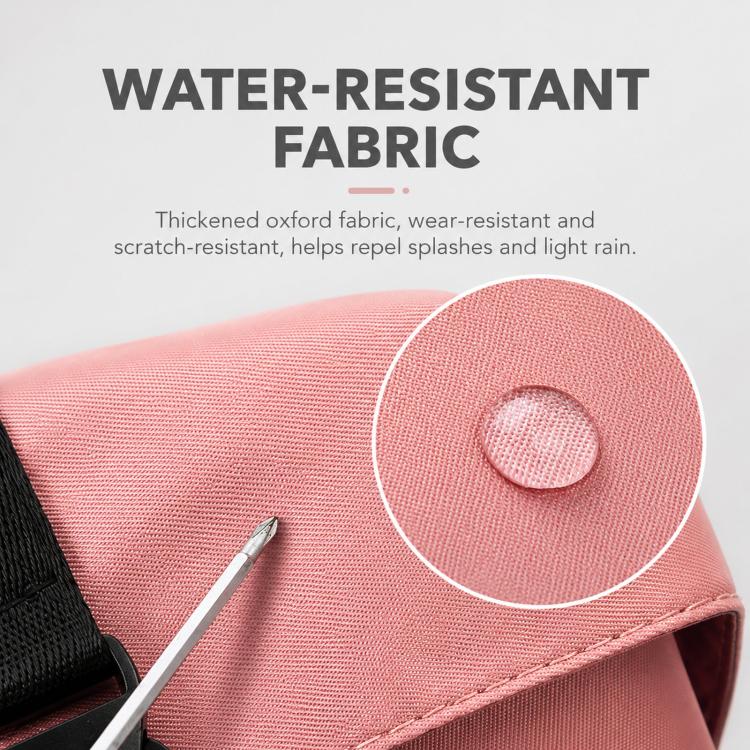 Water-resistant fabric close-up on pink duffel bag with textured weave