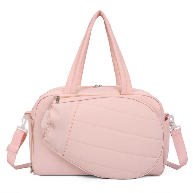 Pink waterproof duffel bag with top handles and side shoulder straps